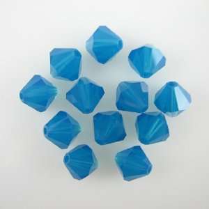  12 8mm Swarovski crystal bicone 5301 C. Blue Opal beads 