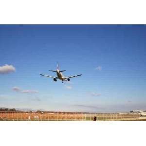 Jet Airplane Landing on Runway in Blue Sky   Peel and Stick Wall Decal 
