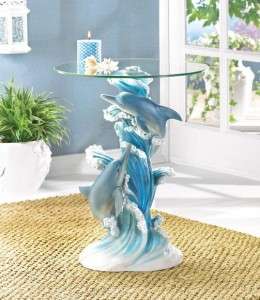 Playful Dolphins in waves glass top table 24 + high great decor item 