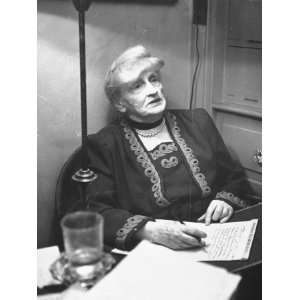  Gertrude Atherton Looking Up Thoughtfully from Her Writing 