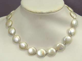   this necklace is made from huge white biwa coin pearls pearls