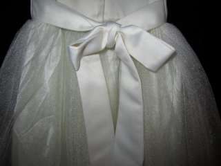   WITH A WIDE BELT THAT TIES IN THE BACK AND MAKES A FABULOUS BOW