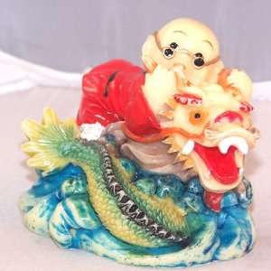    Buddha Boy with Dragon Zodiac Animal Figurine: Everything Else