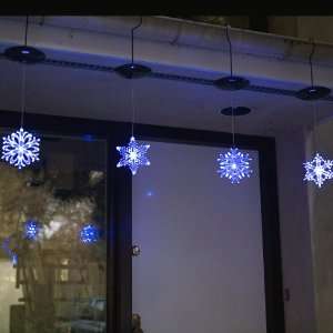   Hanging 6 Glowing Blue White LED Solar Snowflakes (
