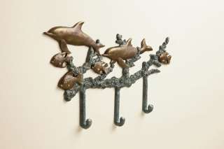   dolphin and tropical fish coat hook is a stylish way to store coats
