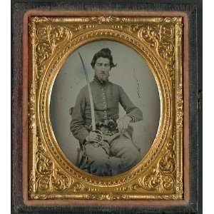 Felix Thompson of Company H,1st Missouri Cavalry Regiment with pistols 