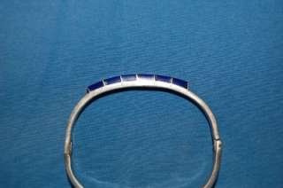We are pleased to offer a sterling silver and lapis hinged bangle 