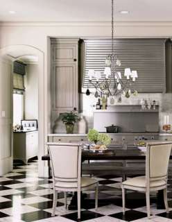 Decorative brackets support uppercabinets to frame the cooking 