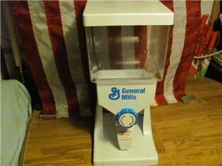 COMMERCIAL GENERAL MILLS CEREAL DISPENSER  CANDY NUTS OR?  