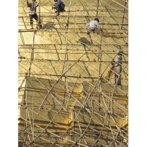  Workers on Bamboo Scaffolding Applying Fresh Gold Leaf to 